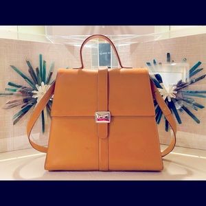 Tiffany & Company elegant simplistic sophisticated natural leather handbag.